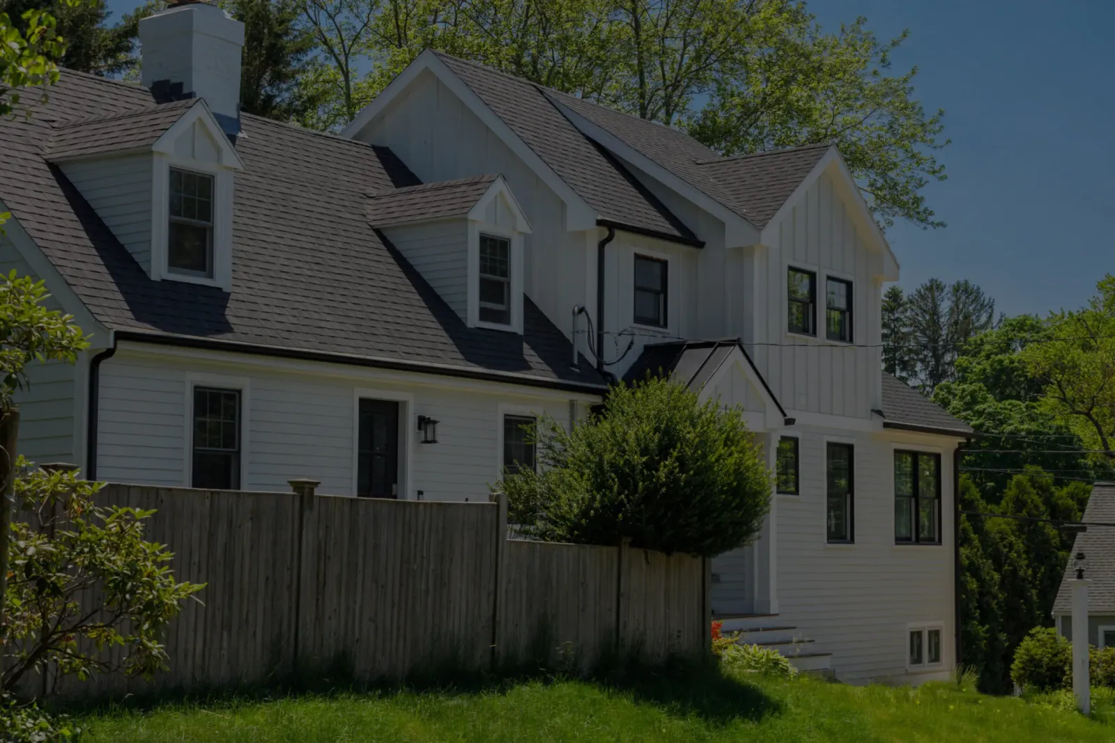Exterior front view of a completed home renovation in Natick, Massachusetts
