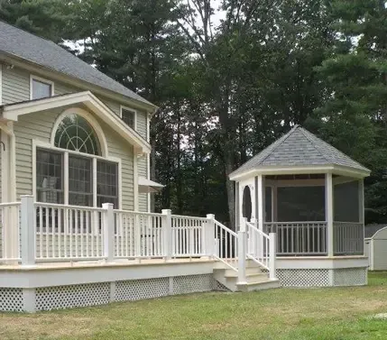 Exterior of New Hampshire Home with custom decking and screened gazebo