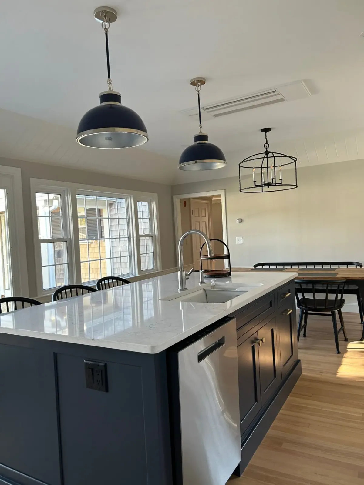 Kitchen island with pendant lights and sink
