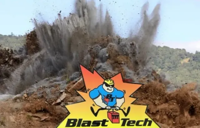 Rock blasting in iron ore quarry.