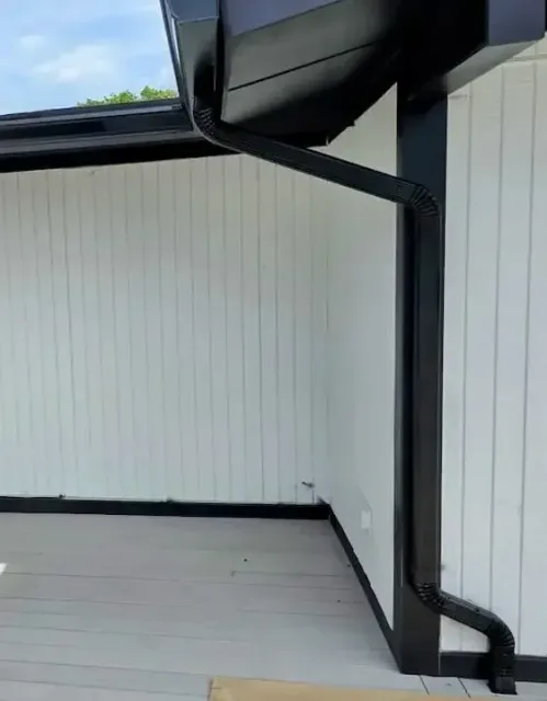 Sleek Black Aluminum Seamless Gutter in Leominster, MA