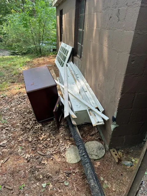Construction debris pile at residential job site