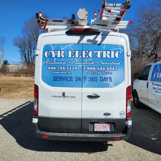 A white van with the word cyr electric on the back