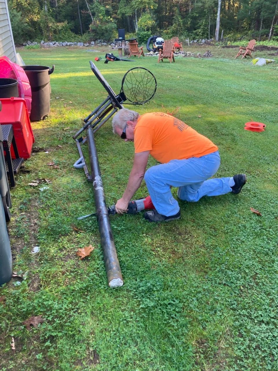 Crew member dismantling equipment for removal