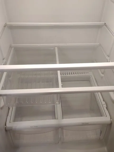 Spotless refrigerator interior after RiseUp Cleaning
