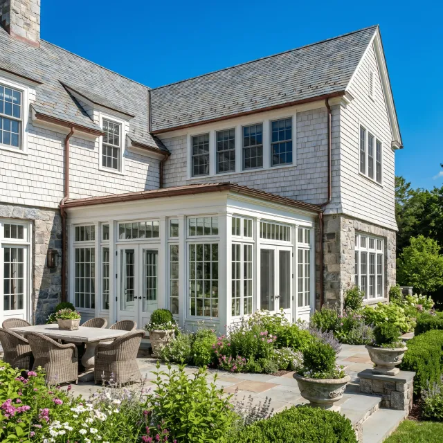 Stylish house exterior with a patio area and garden