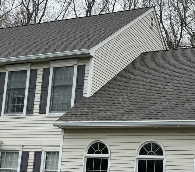 New roof and seamless gutters on a home in Redding, CT