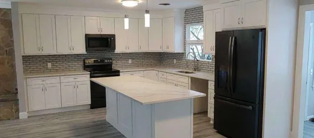White shaker kitchen installed by Quality Design Cabinet