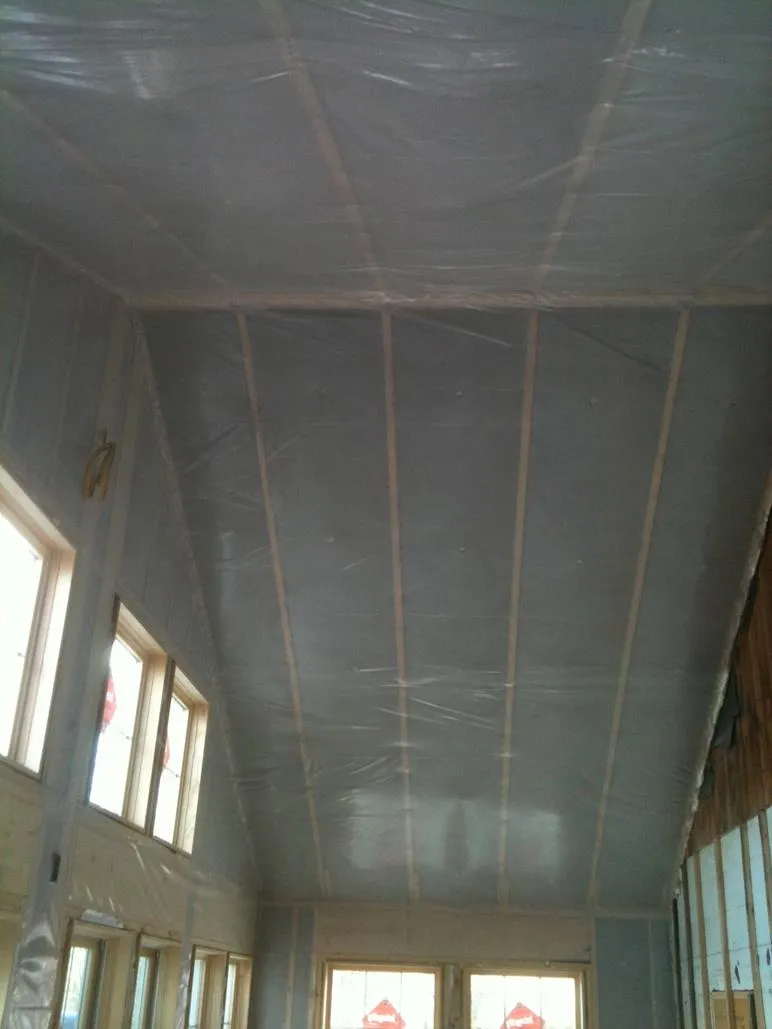 Completed insulation and vapor-barrier work on a Gauthier Insulation job