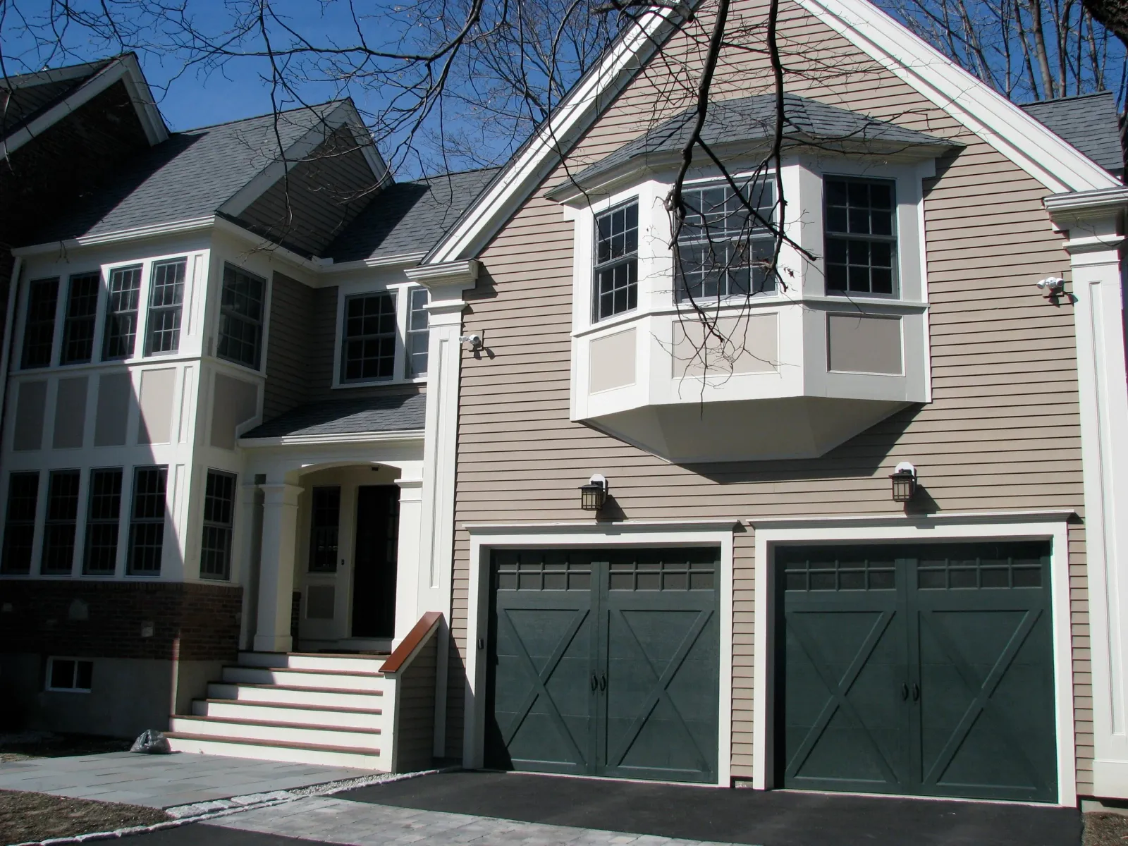 Suburban house with double garage and bay window