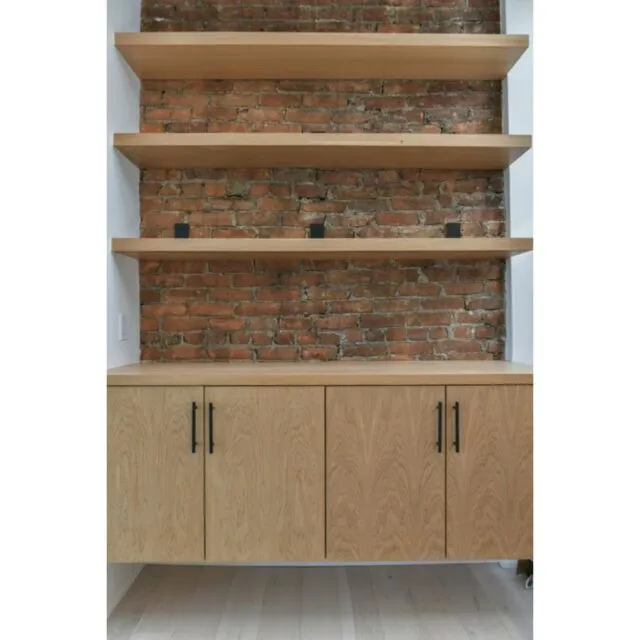 Thoughtful millwork has the ability to transform the way a home functions.

In this project, custom white oak shelving and cabinetry were designed around the existing brick wall, allowing the home's original character to remain a defining feature. The result is a seamless blend of historic texture and contemporary craftsmanship.

Beyond the living space, the same custom approach extends to the closet, where built-in drawers, shelving, and storage solutions create an organized and highly functional space tailored to the homeowner's needs.

Every detail was designed to feel intentional, cohesive, and built specifically for the way the home is lived in.

Details like these are what make a house feel unique.

#AnySeasonDesignBuild #CustomMillwork #BuiltInShelving #WhiteOak #CustomCabinetry #NewEnglandHomes #FineWoodworking #BuiltIns #ThoughtfulDesign #PreservationMatters