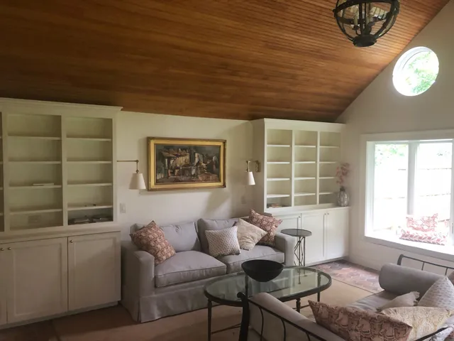 Living room with custom built-in bookcases