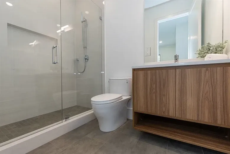 toilet installation, new construction, shower, vanity, sink