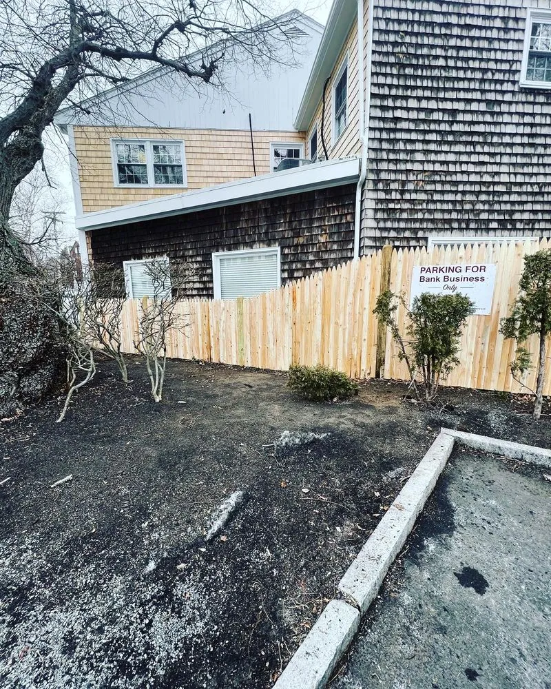 New cedar stockade fence at a commercial bank property