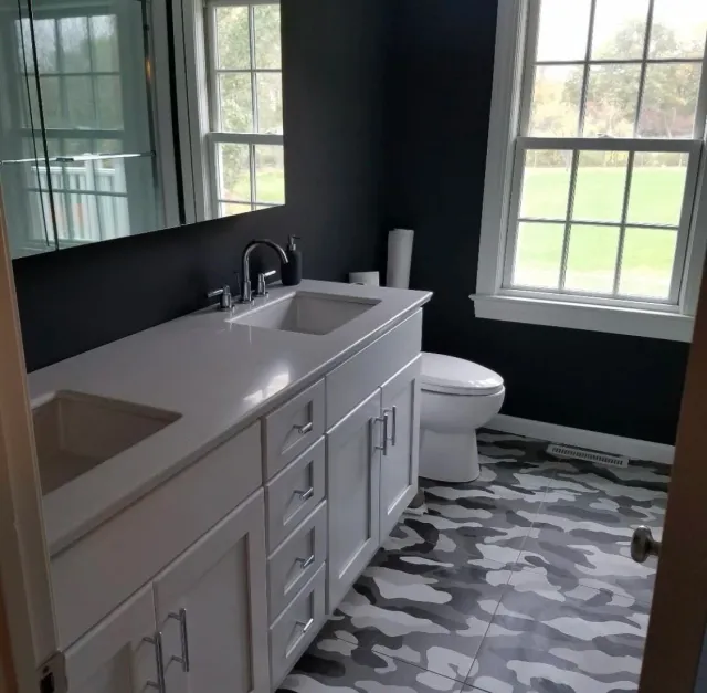 Kids grey and white medium bathroom remodel