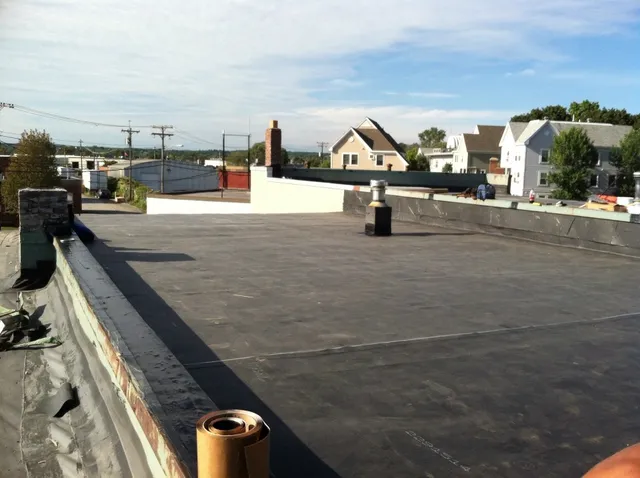 work photo from justroofingmaine.com
