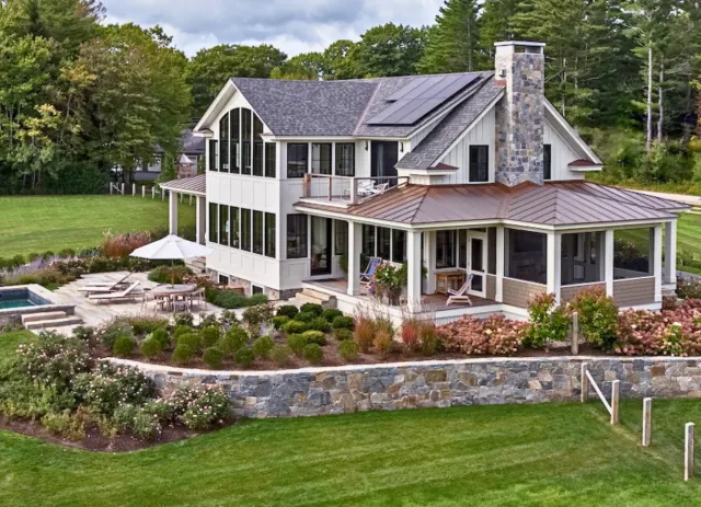 Modern hillside home exterior repaint with fresh siding and trim by Minute Men Painters