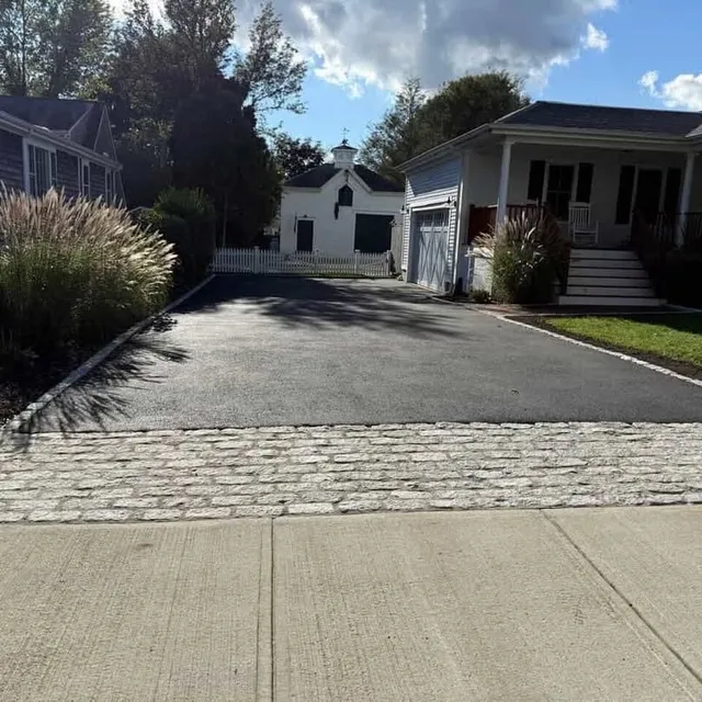 Cobblestone apron at a newly finished driveway