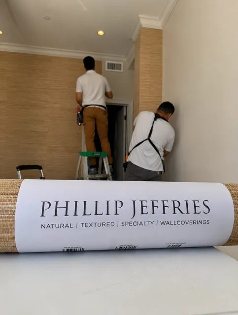 Professional Phillip Jeffries wallpaper installation in a Massachusetts home