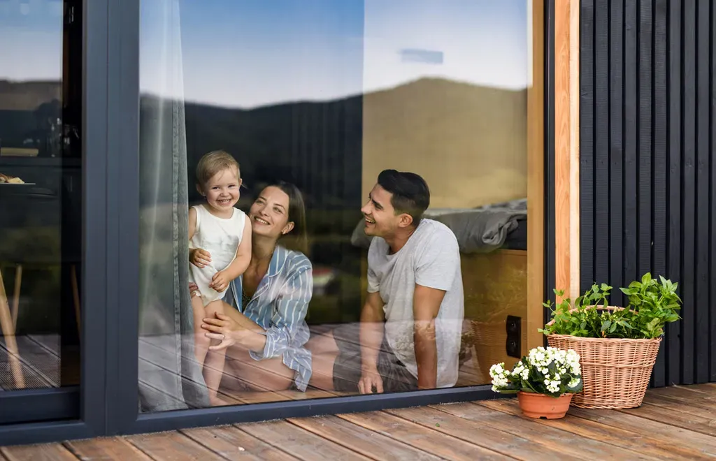 A family enjoying cleaned windows.