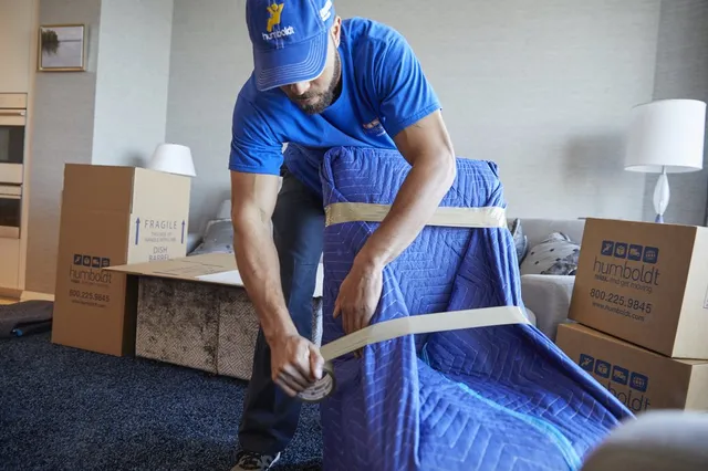 Blanket-wrapping a chair during a residential move