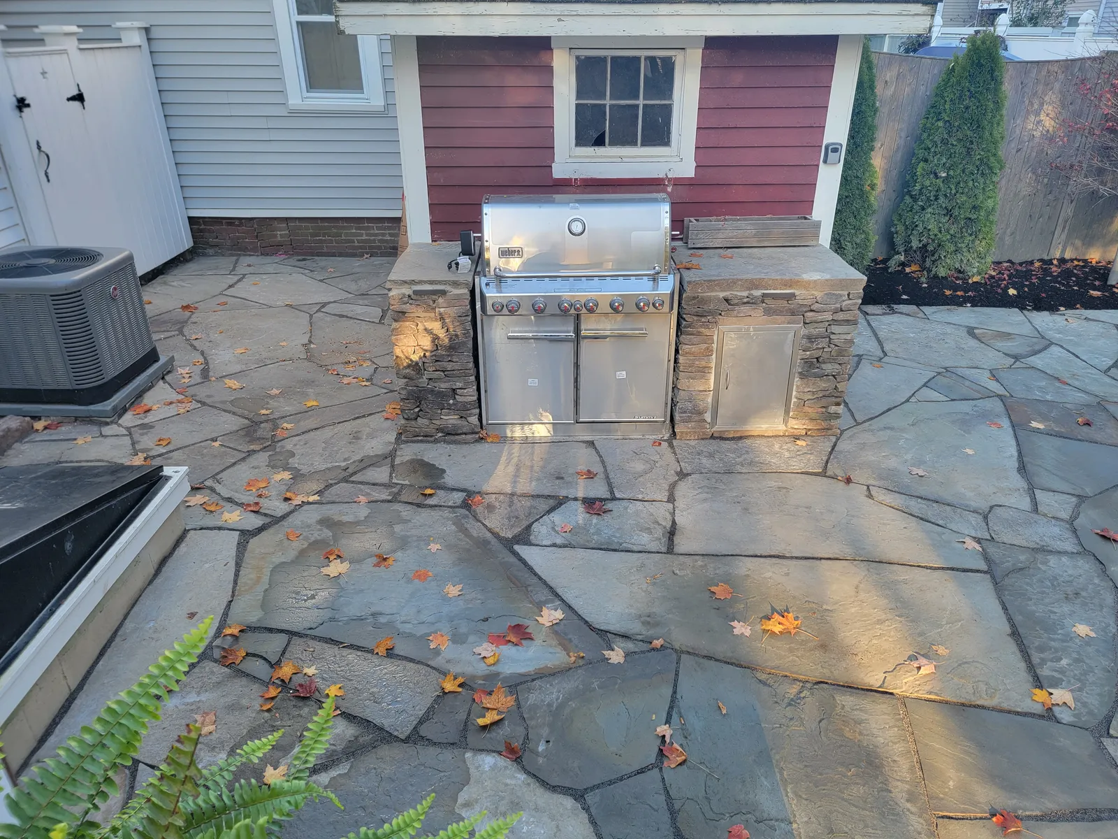 Custom stone patio built by Stiles and Sons in NH Seacoast