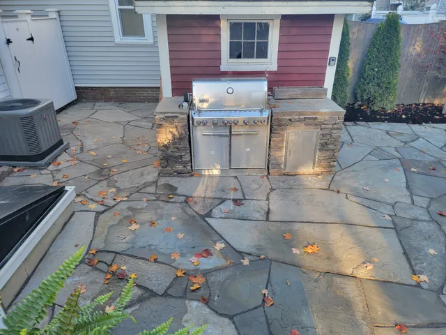 Custom stone patio built by Stiles and Sons in NH Seacoast