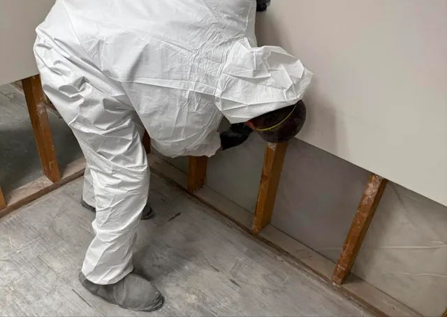 Restoration technician documenting damage for an insurance claim in Hampden County, MA — Mass Restoration Group