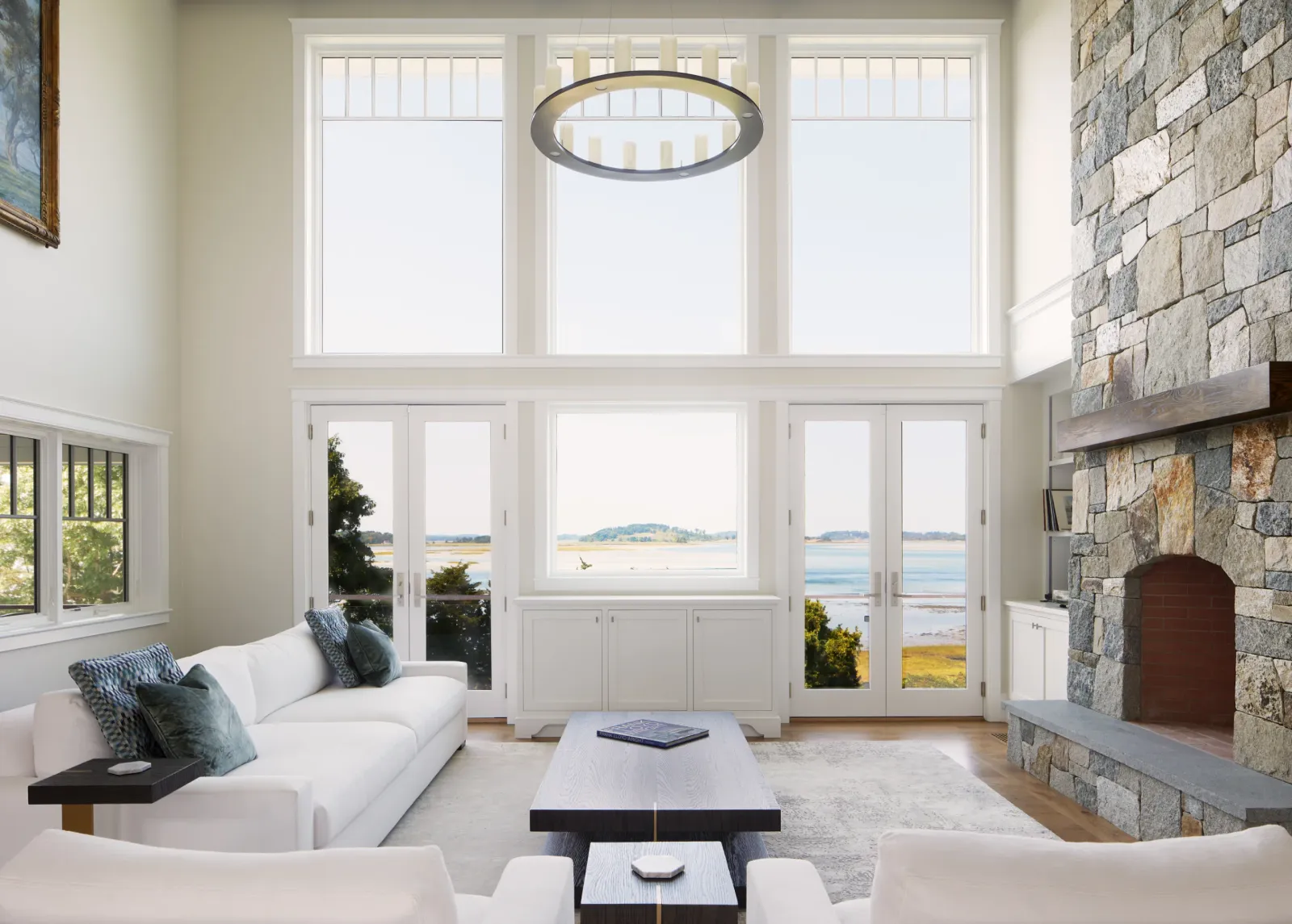 Coles Island project: living room with waterfront windows