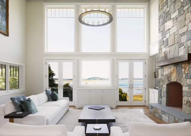 Coles Island project: living room with waterfront windows