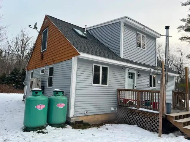 Whole-House Siding Replacement in Atkinson, NH - Before renovation, original condition