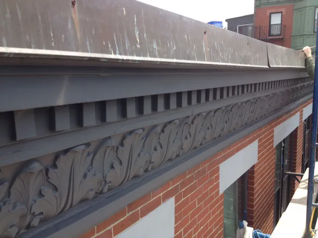 Restored cornice and acanthus detail from staging