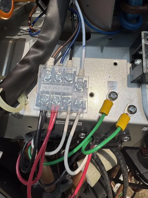 Professional wiring terminal block connections with color-coded wires