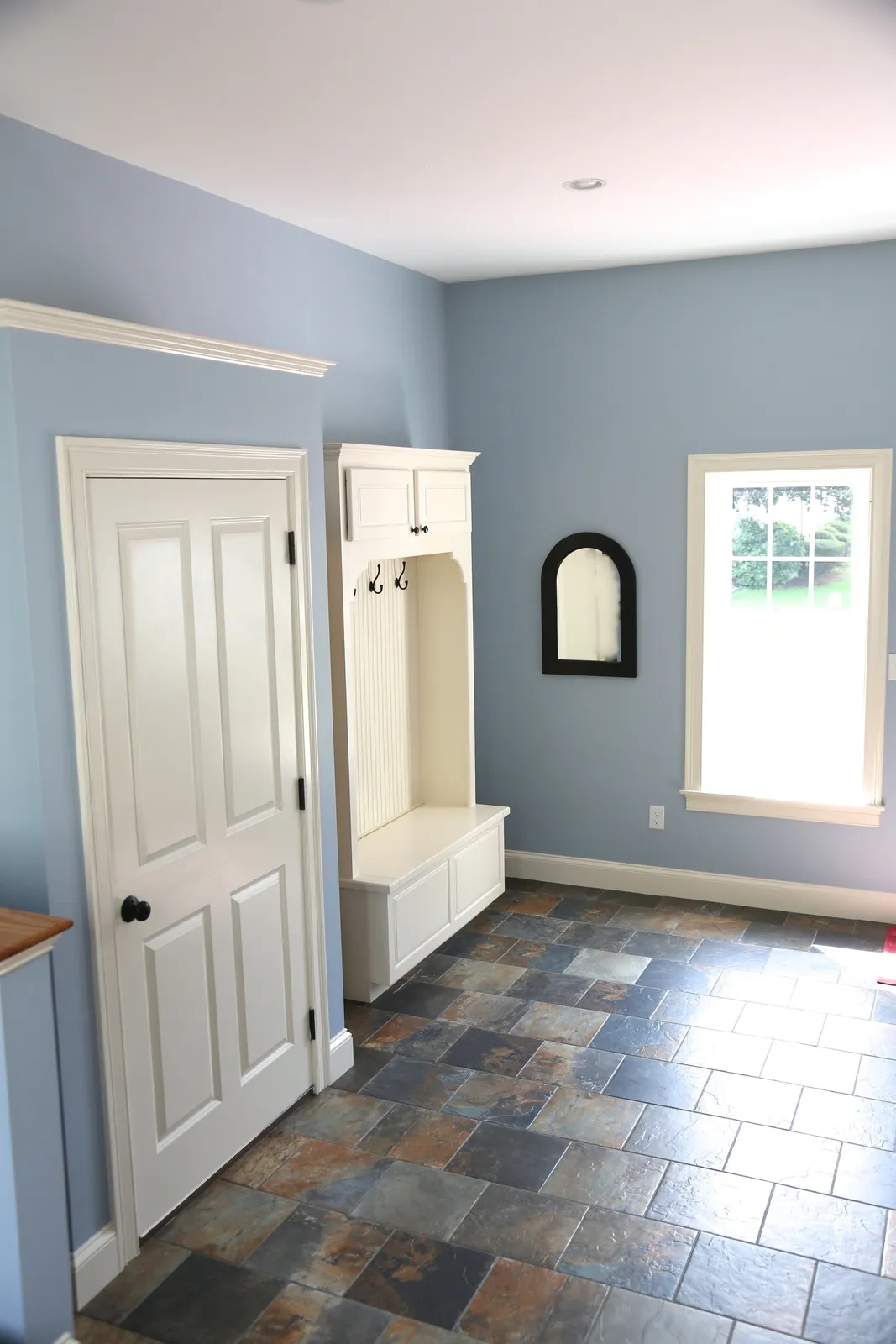 Mudroom tile floor installation