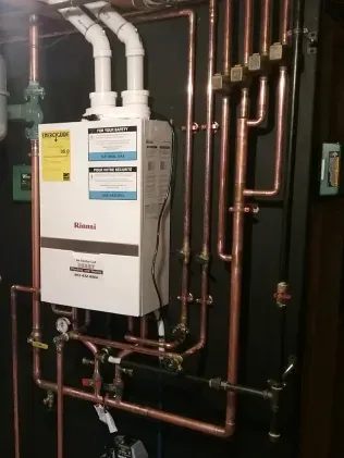 Side View Heating System Installation | Derry, NH | Derry Plumbing & Heating