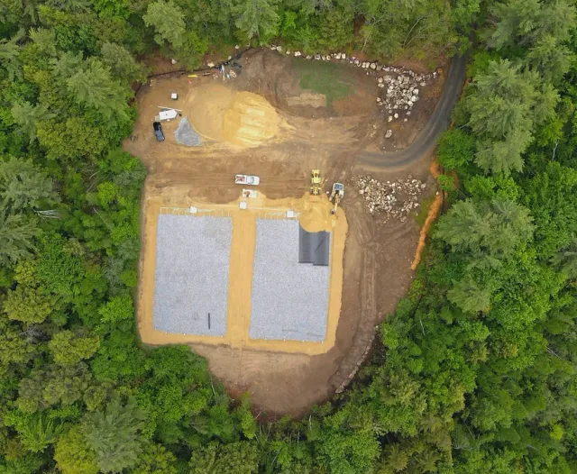 Commercial Sitework Construction in Rindge new hampshire. Showing excavation, site planning, layout, earthwork, utilities, mill and overlay
