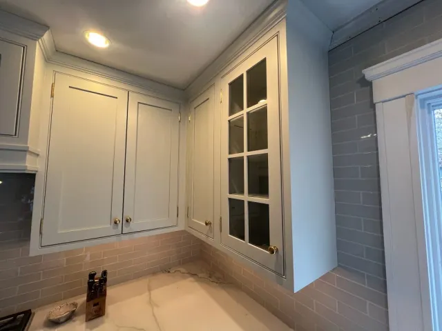 Completed cabinet refinishing detail by Gallagher Painting