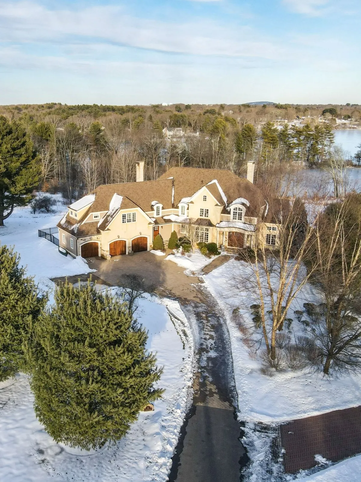 Exterior of large custom home in Walpole, MA built by Walsh Bros Builders