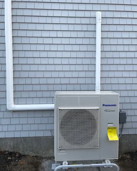 Mini-split condenser installed with line-set covers