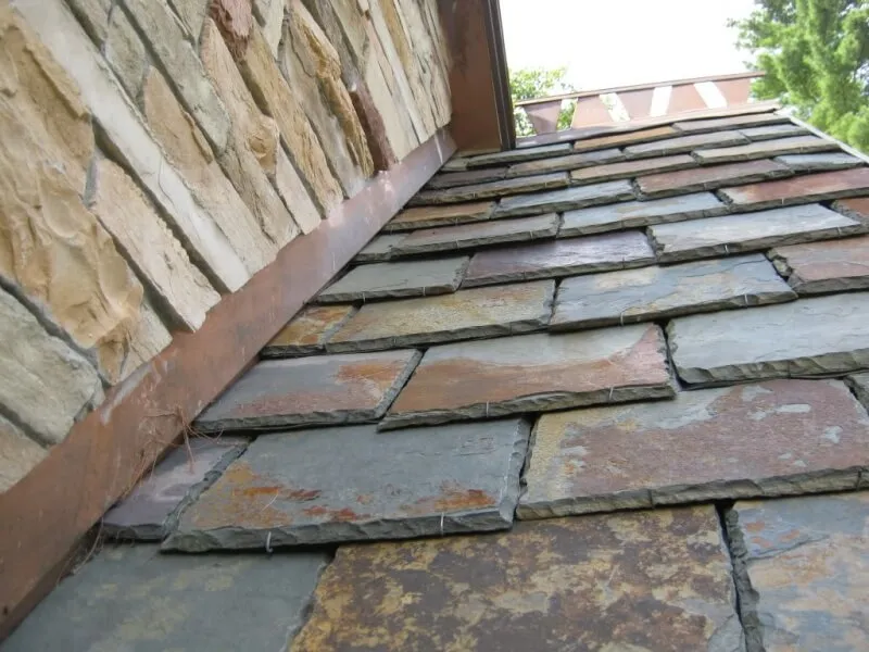 Slate roof with copper step flashing