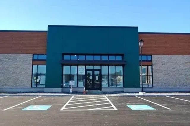 Empty storefront with parking lot