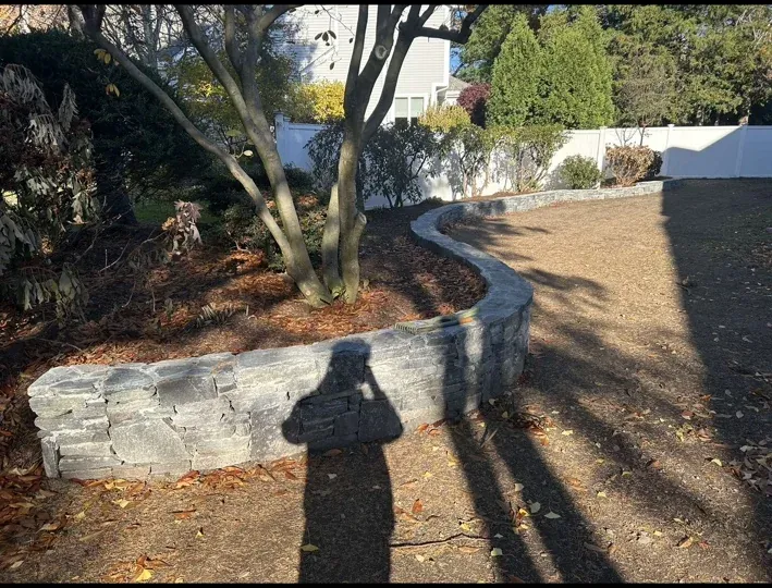 curved stone retaining wall hardscape
