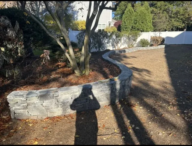 curved stone retaining wall hardscape