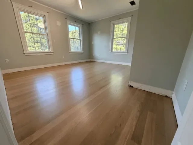 Bolton room after white oak installation and refinishing