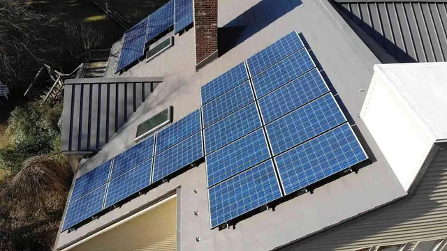 Rooftop solar panel array mounted onto a metal roof system on a residential home.