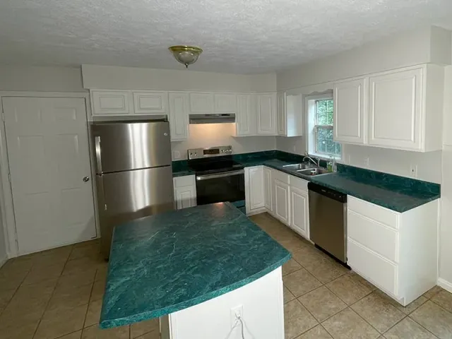 Cabinet refinishing services provided by MJ's Painting