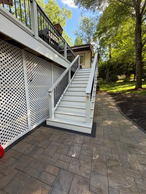 Detailed paver finish around the stairs during the Bellingham Massachusetts patio project