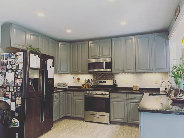 Kitchen cabinets after Gallagher Painting refinishing
