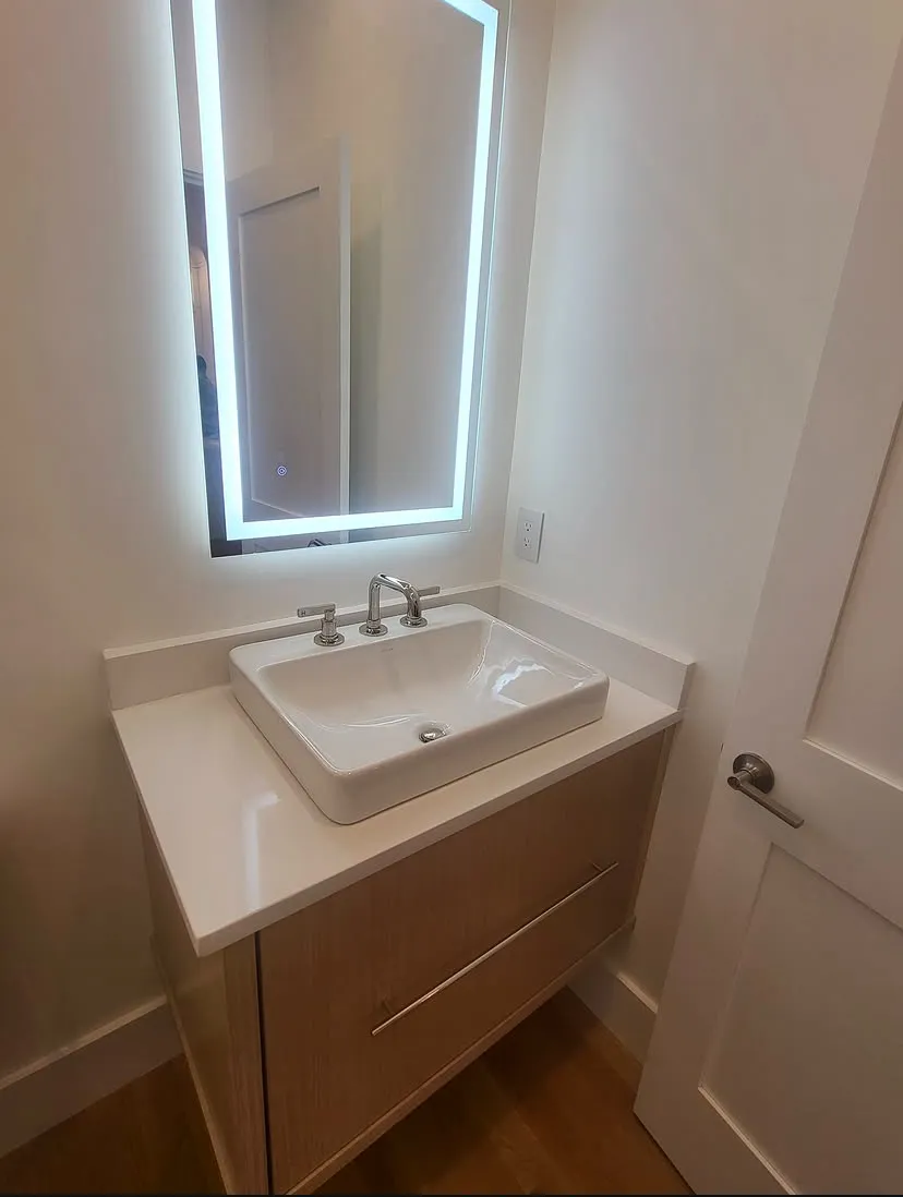 Powder room vessel sink and faucet installation completed by Aroso Plumber Methuen