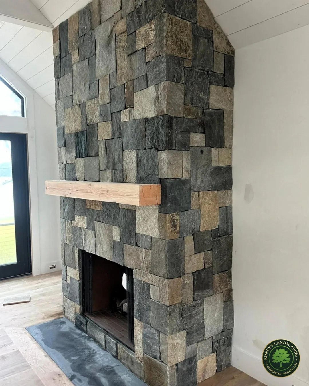 Chimney veneer done right ??
Clean lines, natural stone, and a finish that transforms the entire space.

#ChimneyVeneer #StoneVeneer #MasonryWork #RoneysLandscaping #CapeCodHomes